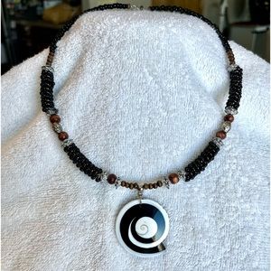 One of a kind!  Seashell and beaded handmade necklace from Bora Bora